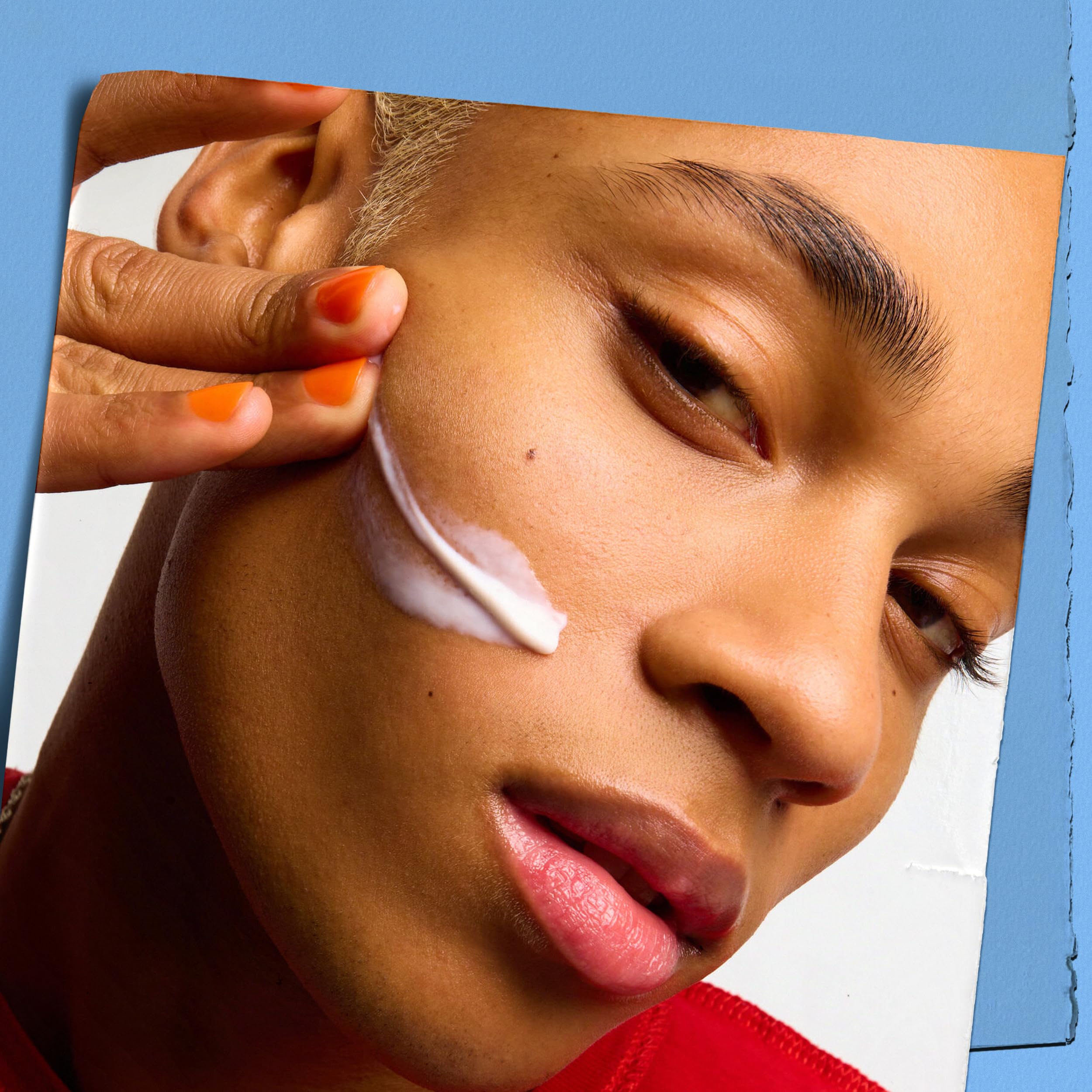 Kiehl's Ultra Facial Moisturizer texture spread on skin shows light absorption.