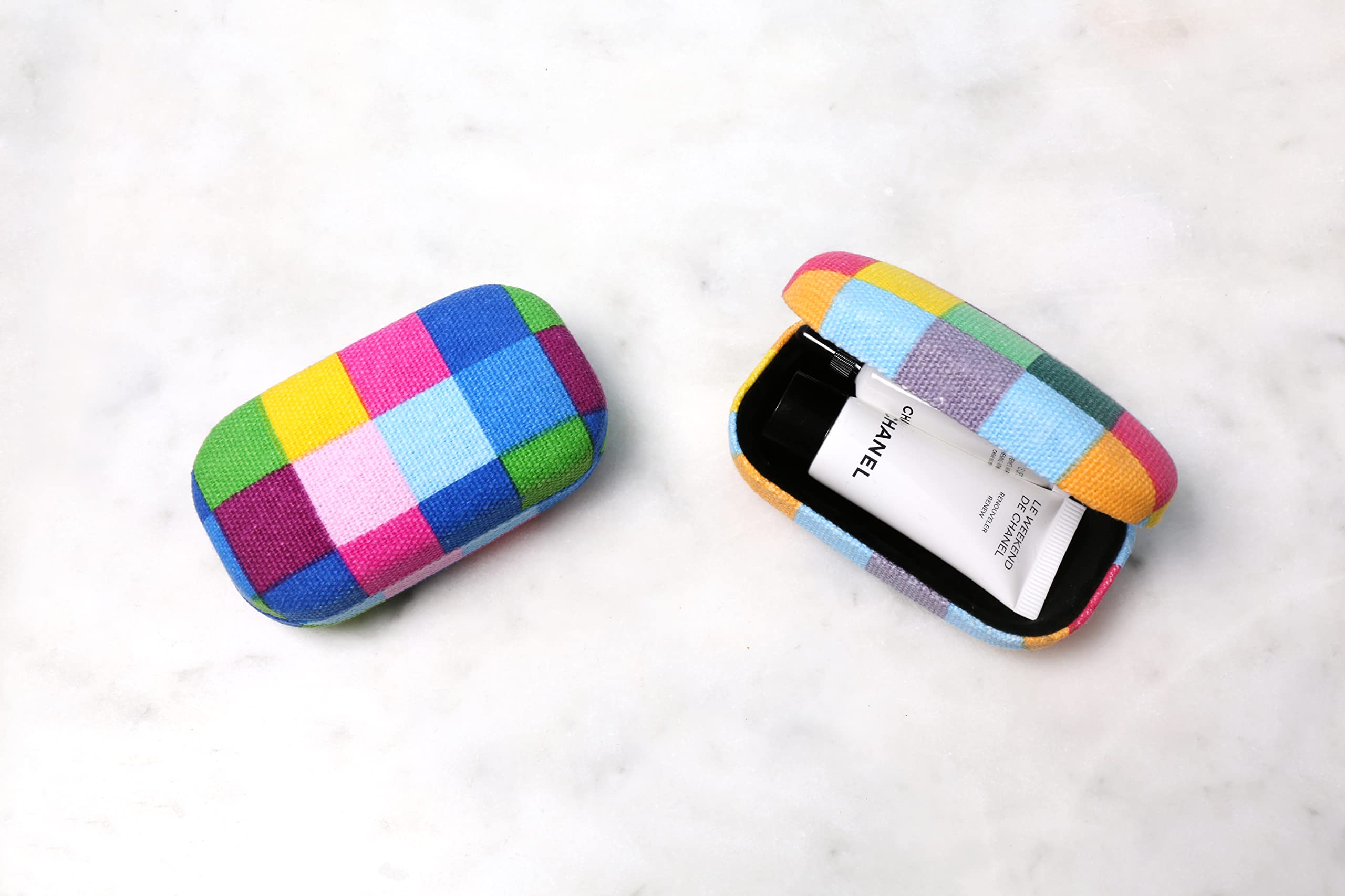 Kikkerland travel case fits in purses for quick access.