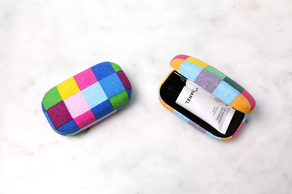 Kikkerland travel case fits in purses for quick access.
