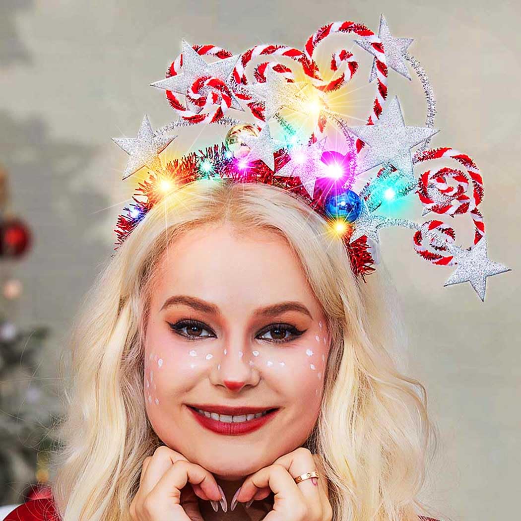 Kilshye light up star headband showcases Christmas colors for cheerful celebrations.