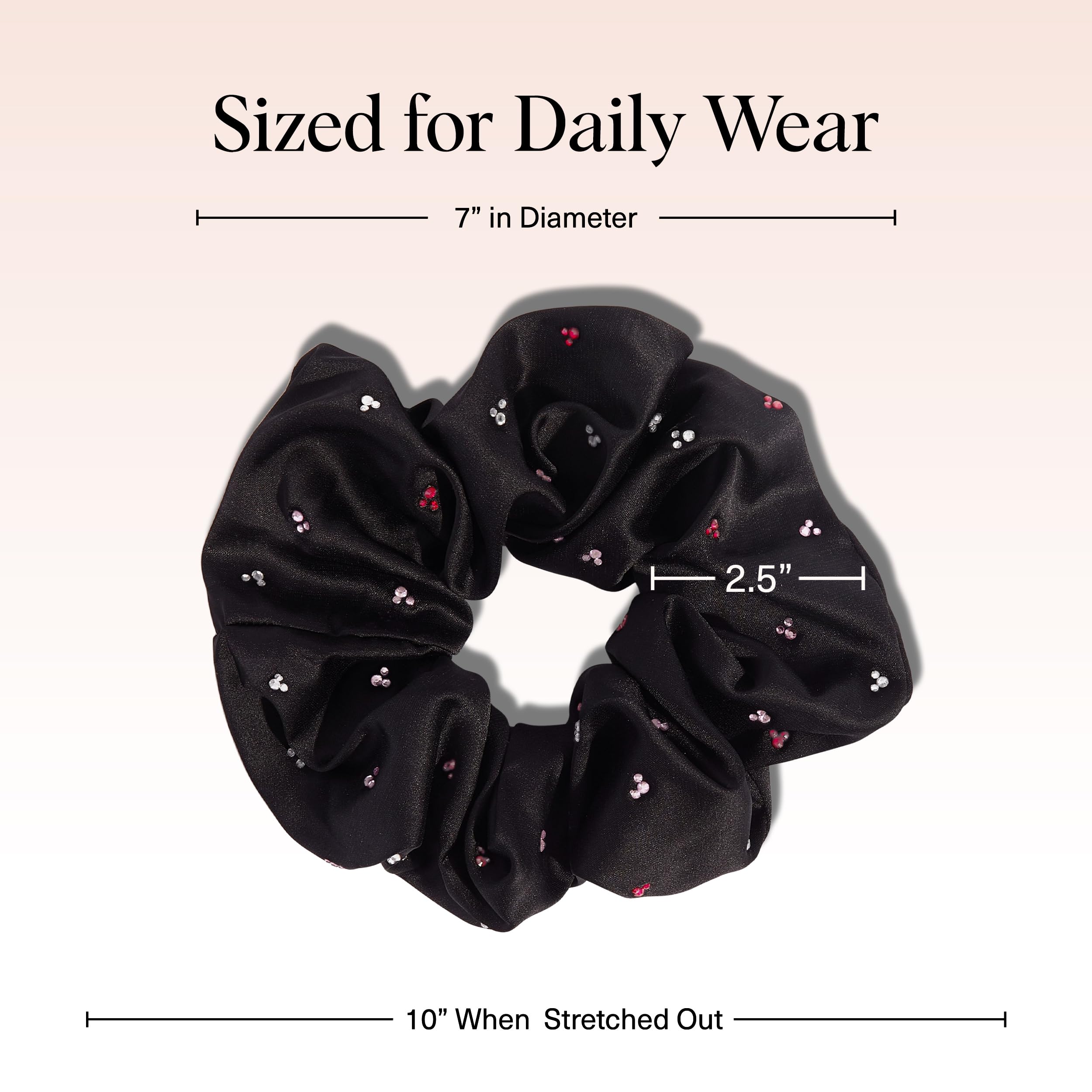 Kitsch black fabric rhinestone scrunchie worn in an updo for day-to-night styling.