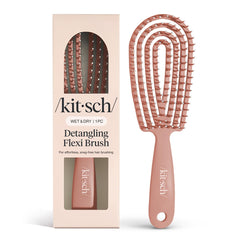 Kitsch Detangler Brush with bendable frame gliding through tangles for gentle detangling.