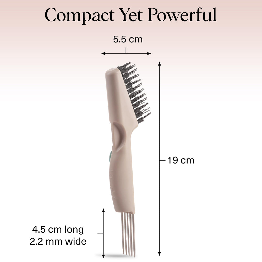 Kitsch hair brush cleaner tool in use demonstrates comfortable hand grip.