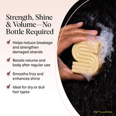 Kitsch shampoo bar in hand shows portable, eco-friendly travel-ready cleansing.