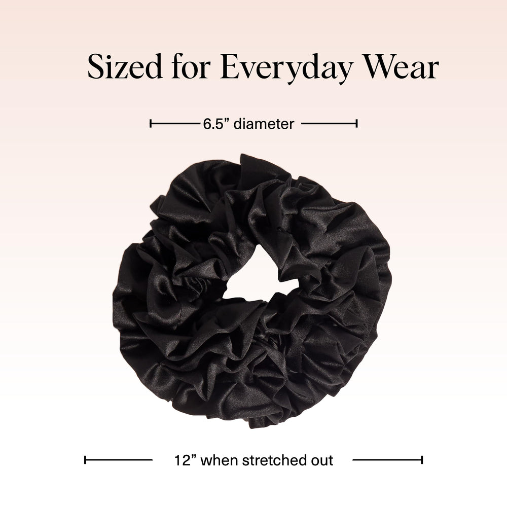 Kitsch satin scrunchie close-up reveals soft fabric and ruffle edge for daily wear