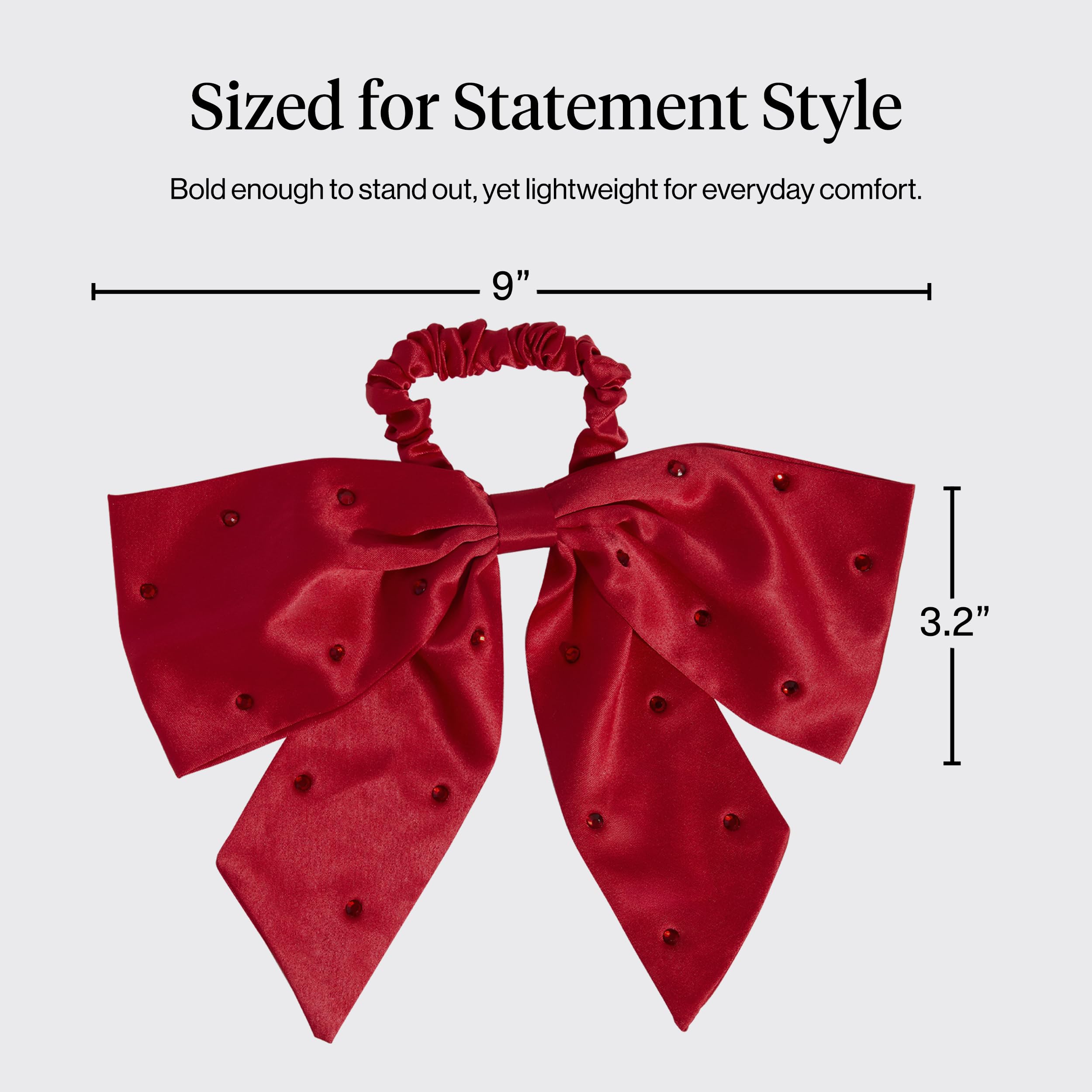 Kitsch satin scrunchies bun-style shot highlights sleek, snag-free updo.