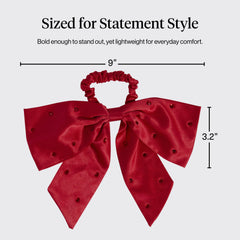 Kitsch satin scrunchies bun-style shot highlights sleek, snag-free updo.