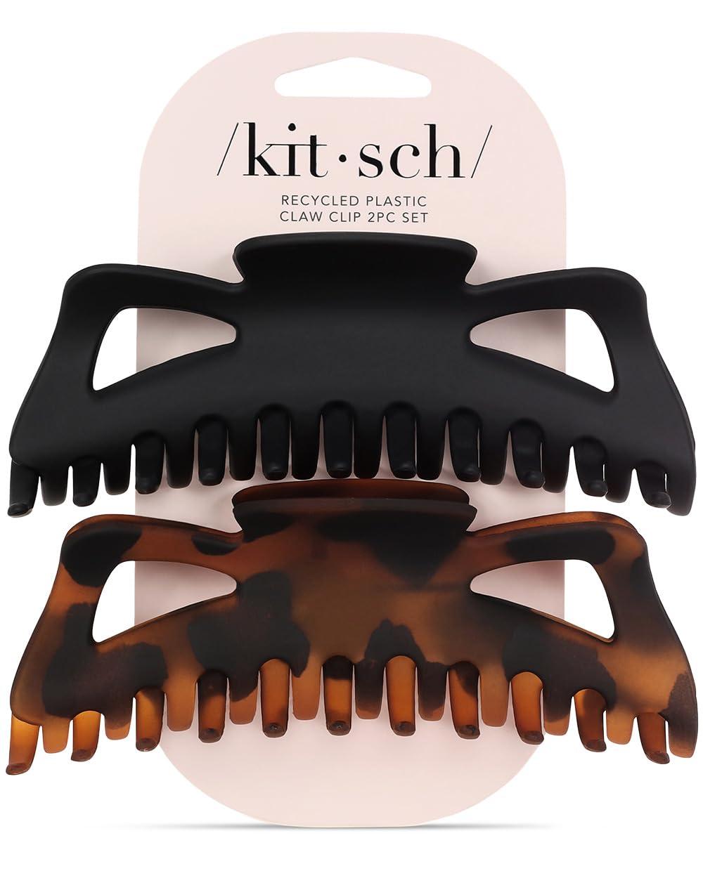 Kitsch two-pack hair clips in black and tortoise for versatile styling options.