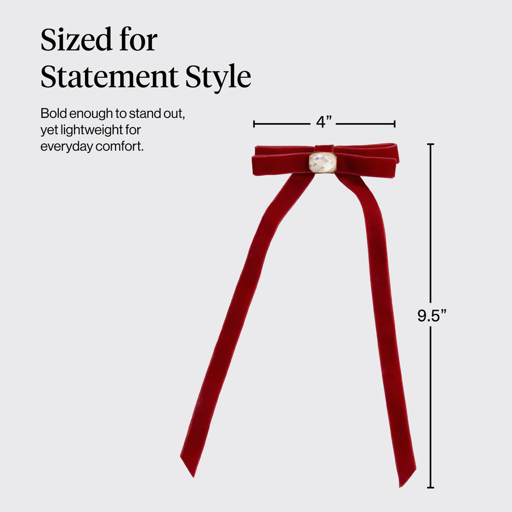 Kitsch velvet bow clip half-up style close-up, easy daily styling.