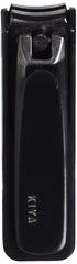 KIYA Nail Clipper Black Steel held in hand showing ergonomic grip.