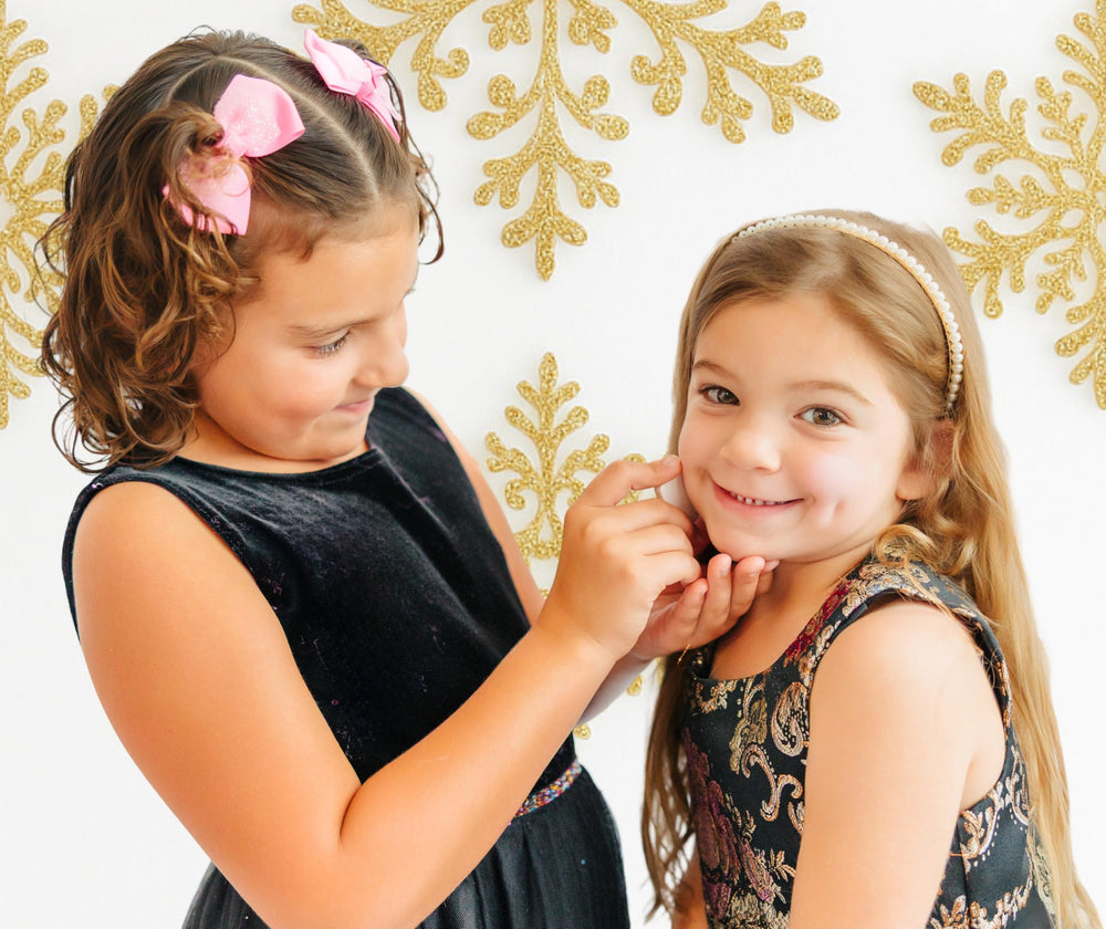 Klee Naturals Austin water-based nail polish showcases quick-drying, glossy finish for little manicure moments.