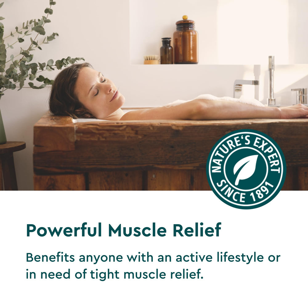 Soaking in Kneipp Arnica bath with saffron-tinted water and aroma.
