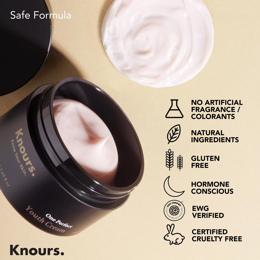 In-hand swatch of Knours cream showing a light pink tone.