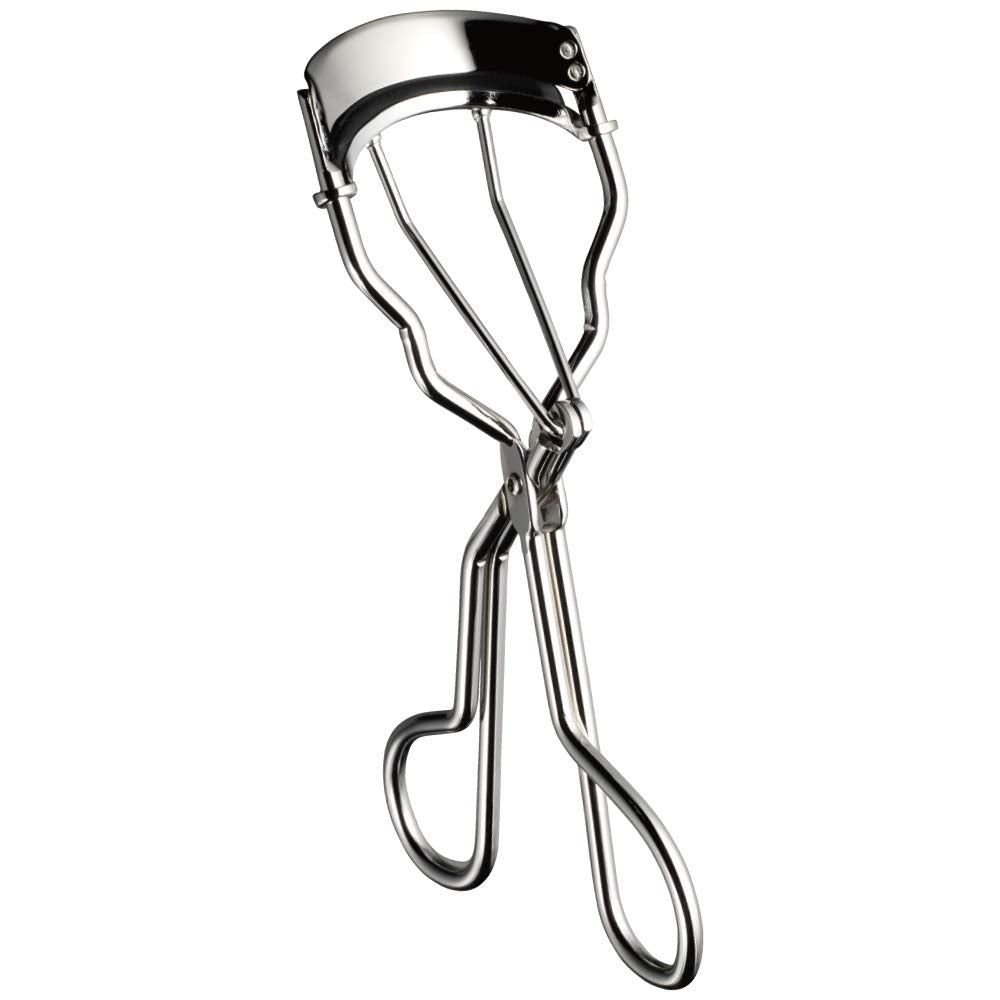 Koji Curving Eyelash Curler angled view reveals arcuate frame spreading lashes evenly