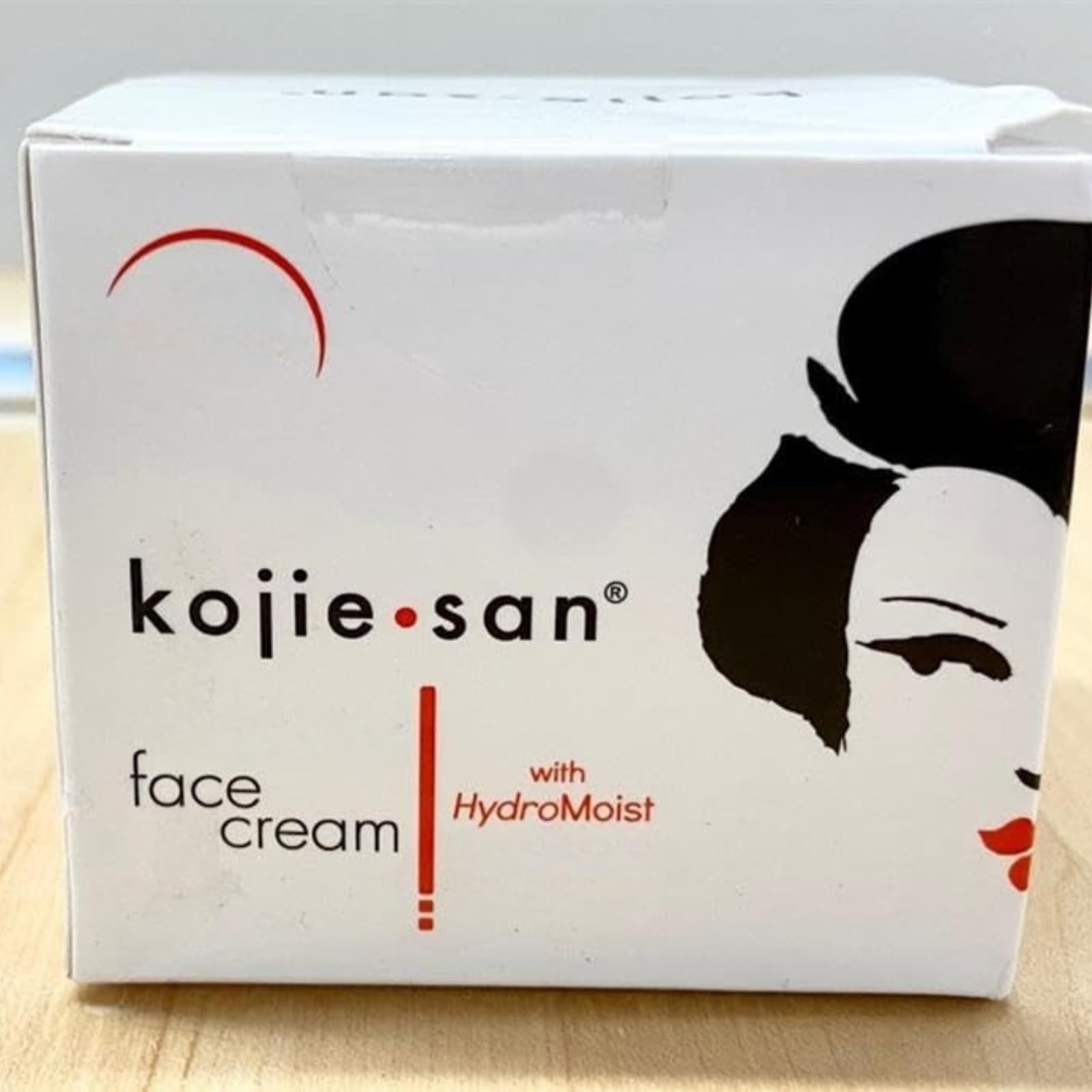 Kojie San kojic acid soap closeup targeting uneven skin tone.