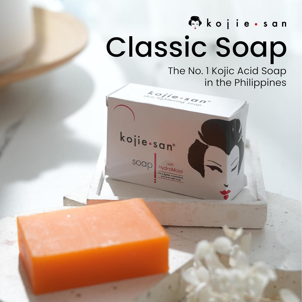 Kojie San Original Kojic Acid Soap Bar bubbles on a dish highlighting gentle cleansing.