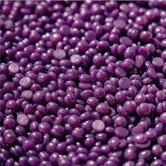 Close-up of KoluaWax coarse-hair beads for multi-area application.