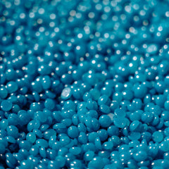 KoluaWax kit contents image showing 1lb beads and 10 applicator sticks.