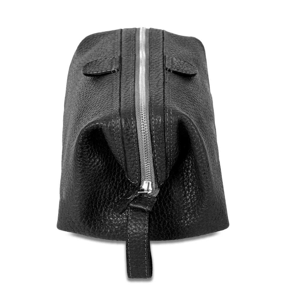 KomalC sturdy bag construction supports daily use for frequent travelers.