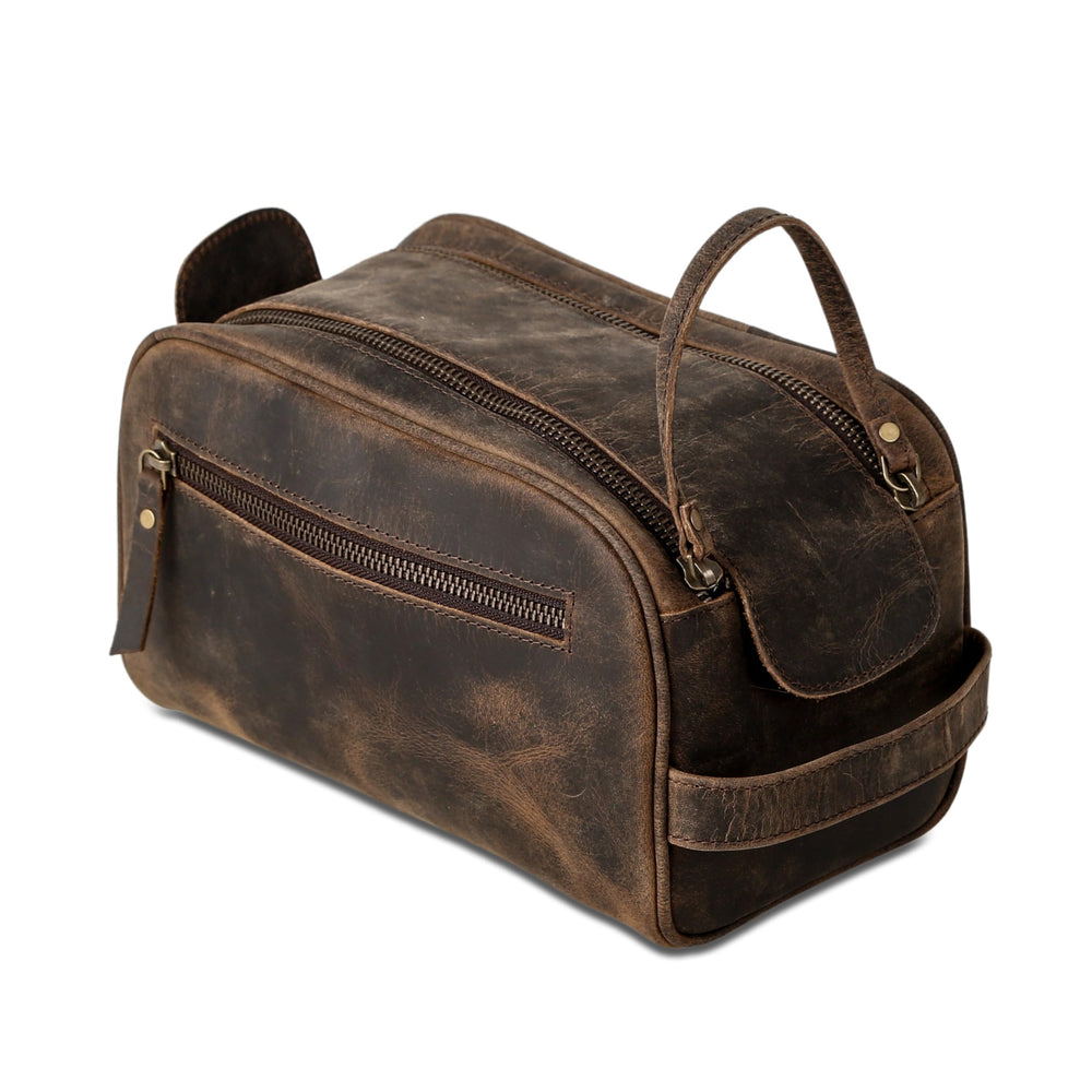 KomalC leather toiletry bag with YKK zippers for durable performance.