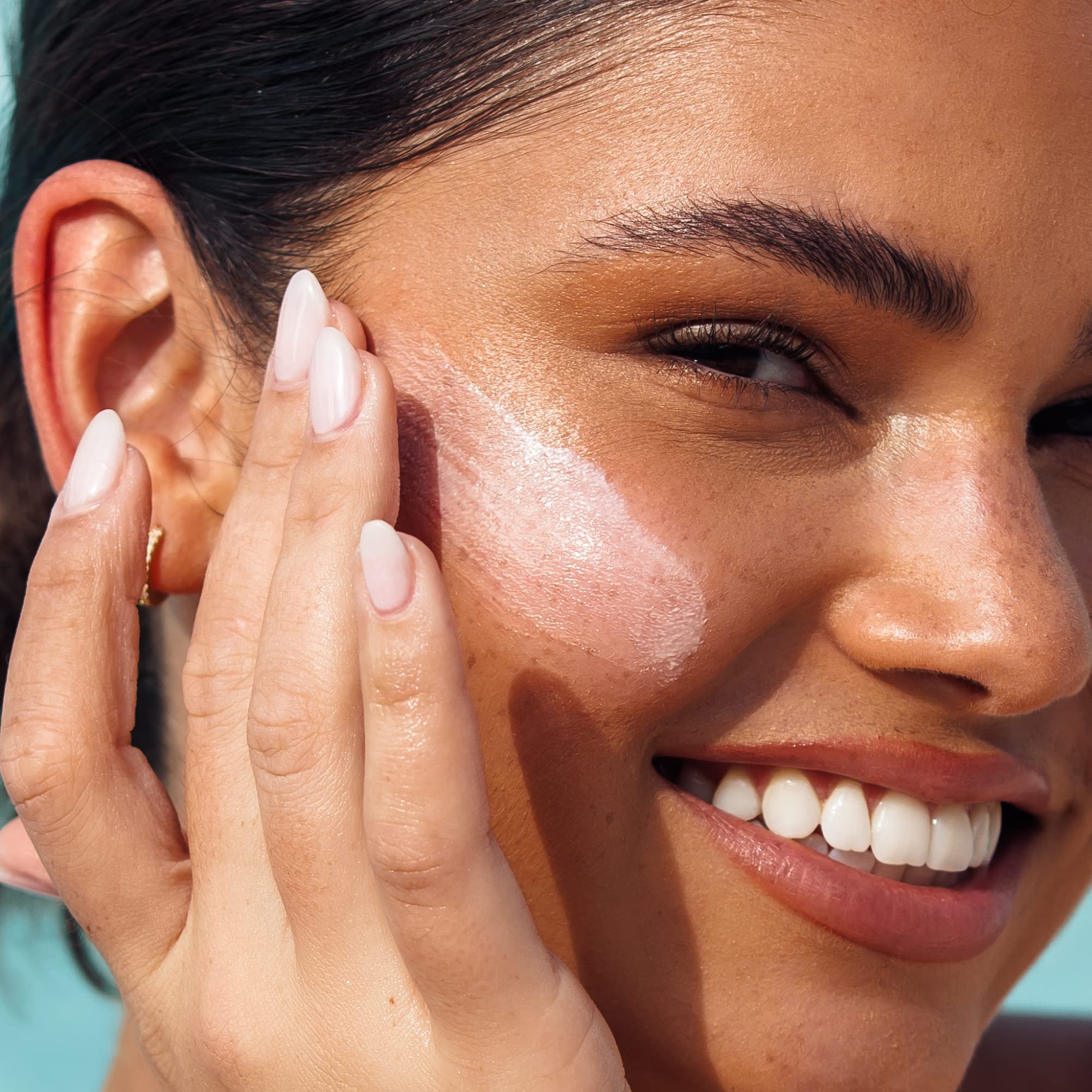 Kopari Antioxidant Face Shield shows no white cast on skin tone.