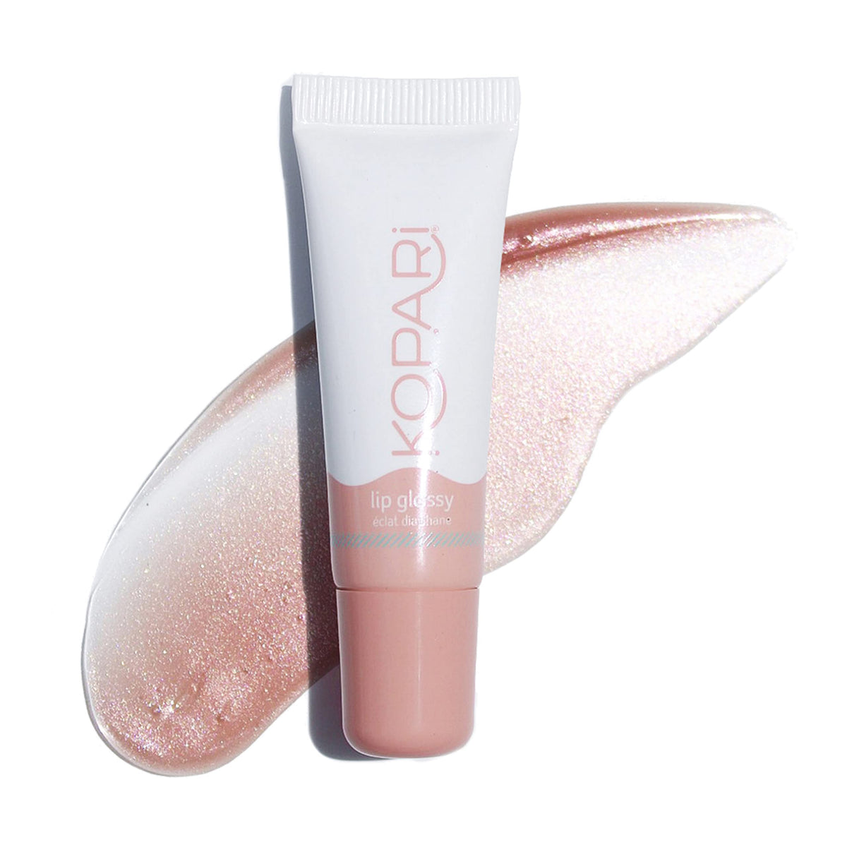 Kopari Coconut Lip Glossy Nude Tint application swatch provides hydrated shine for everyday lips