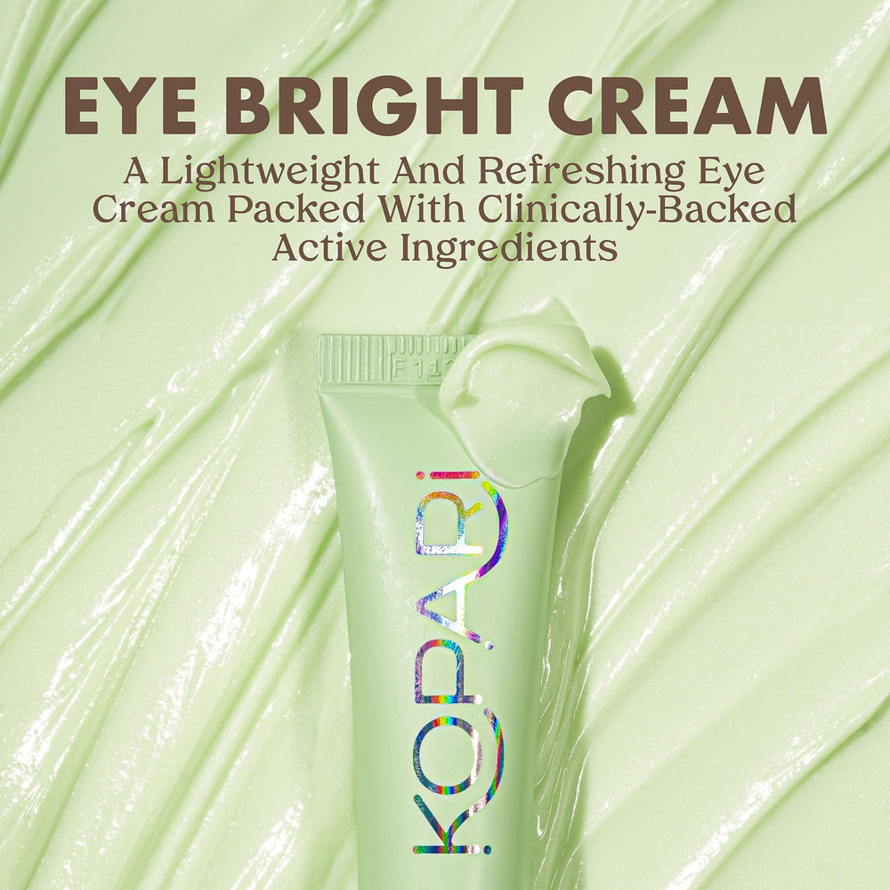 Close-up of dispensing Kopari Eye Bright Cream highlighting cooling texture