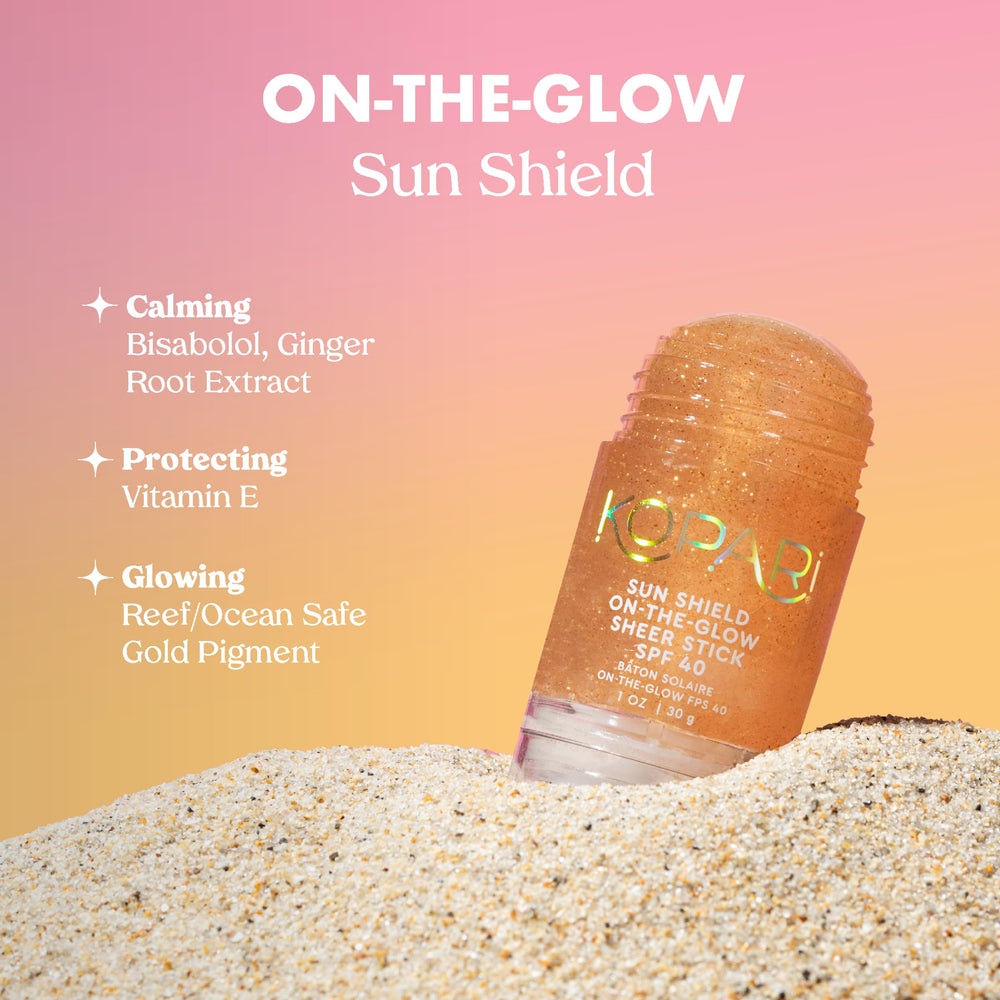 Kopari Sun Shield On-The-Glow gliding smoothly over skin with makeup