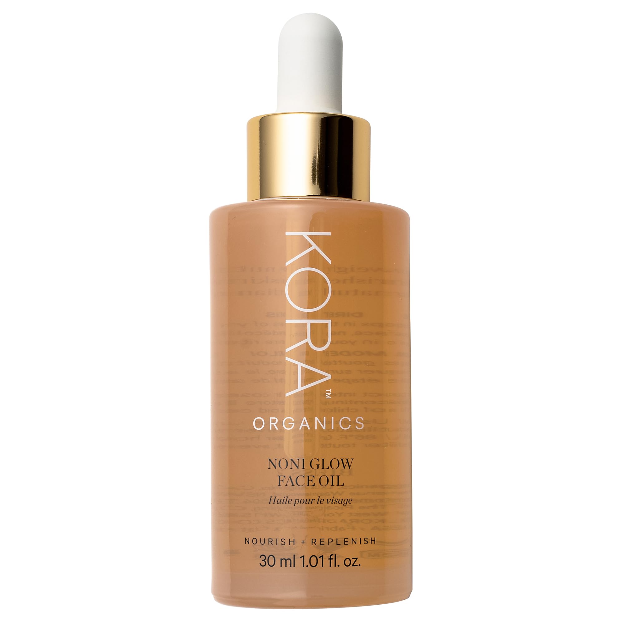 KORA Organics Noni Glow bottle pour for seamless daily facial oil application.