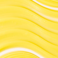 KORA Organics Turmeric Glow on skin demonstrating smooth non greasy absorption