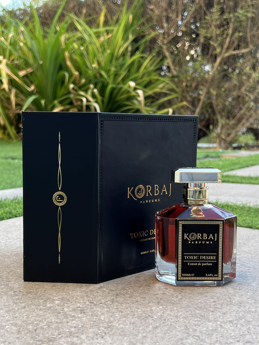 KORBAJ PARFUMS Toxic Desire unisex-bottle-packaging showing versatile appeal for him or her