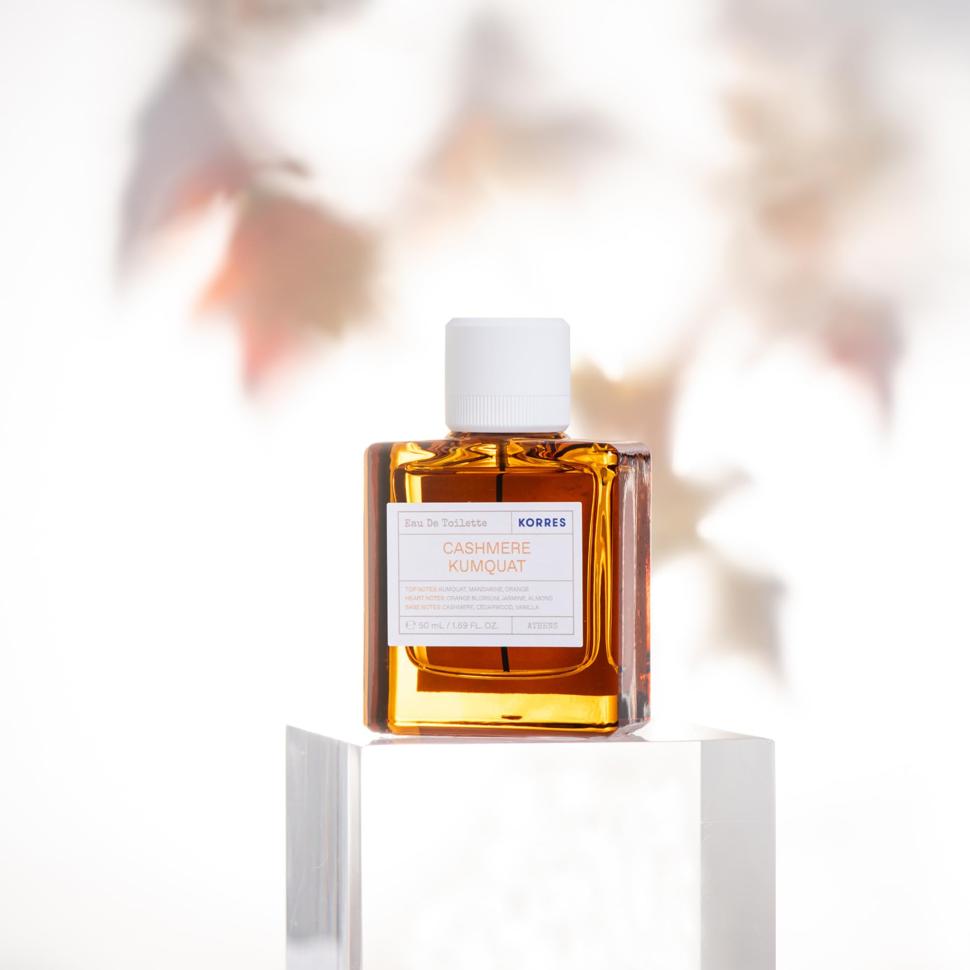 KORRES Cashmere Kumquat EDT kumquat fruit close-up evokes bright, juicy zest for daytime wear