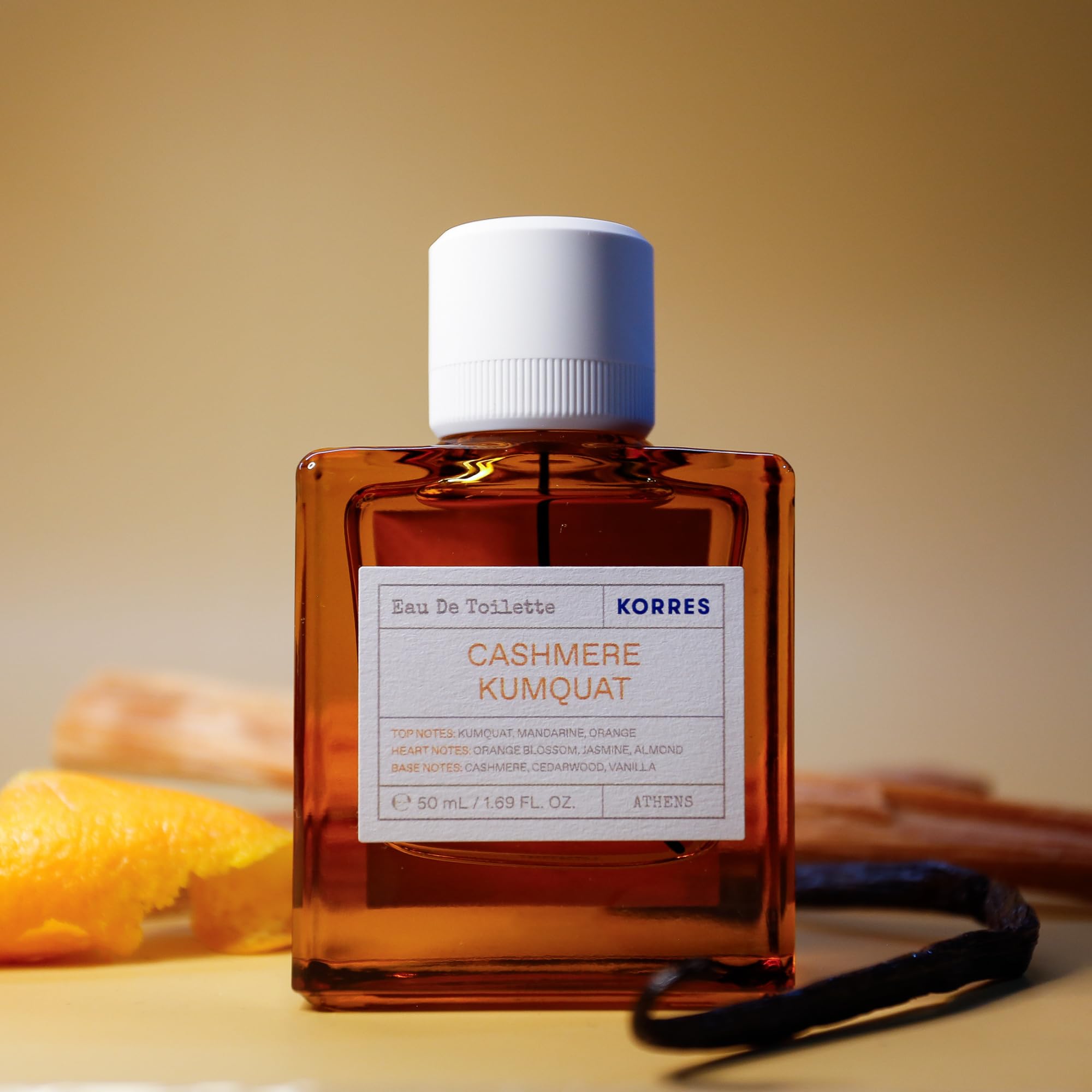 KORRES Cashmere Kumquat EDT packaging and cap detail signals premium Greek brand craftsmanship