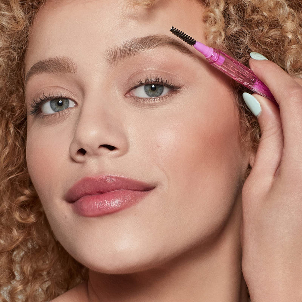 Kosas Brow Pop castor oil formula nourishes brow hairs.