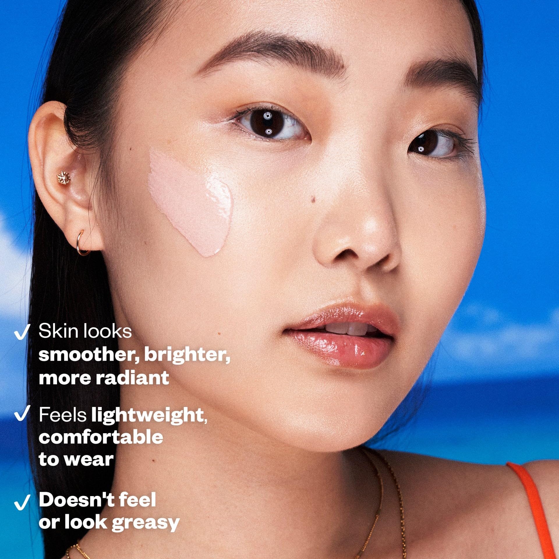 Kosas DreamBeam hyaluronic acid moisture closeup highlights hydrated skin