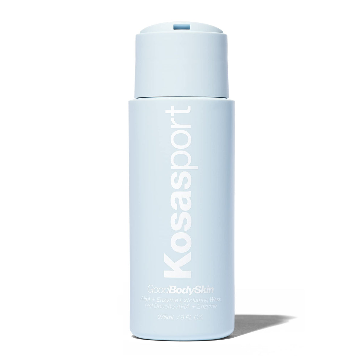 Kosas Kosasport Good Body Skin bottle being poured, highlighting exfoliation for smoother body skin.