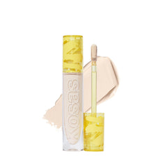 Kosas Revealer Concealer under-eye brightening application for refreshed eyes.