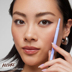 Kosas Soulgazer retractable pencil extended for precise line and minimal mess.