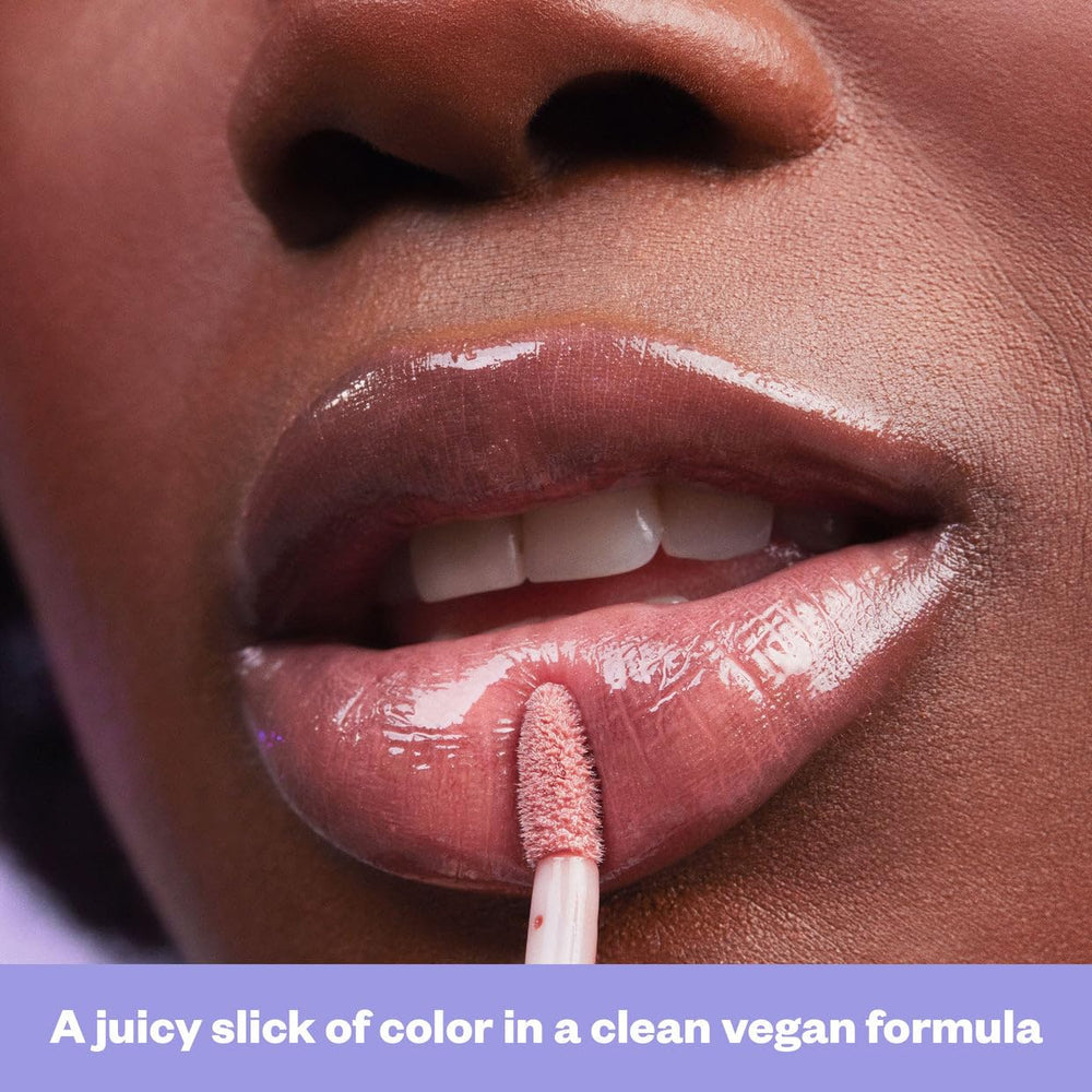 Kosas Wet Lip Oil Gloss contoured applicator hug for precise use.