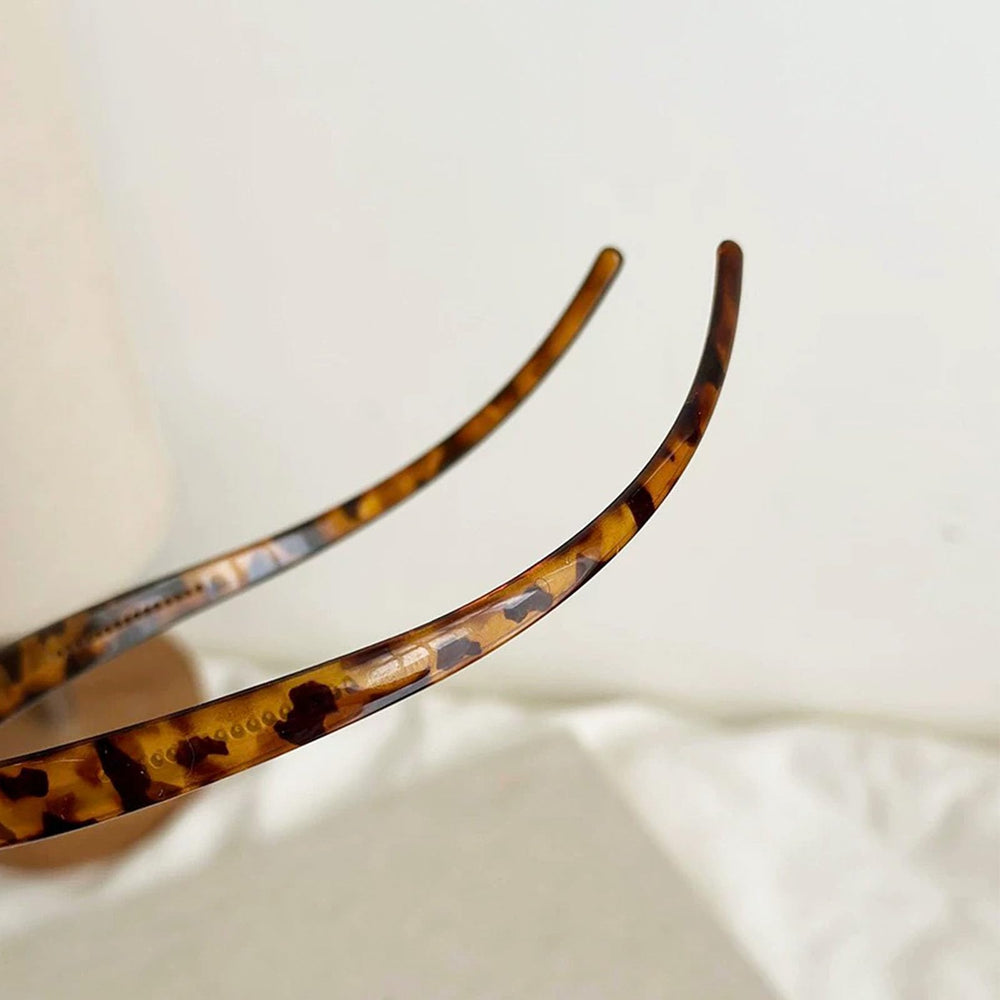 KOVOLITU leopard headband dimensions image confirms compact 12x15 cm size.