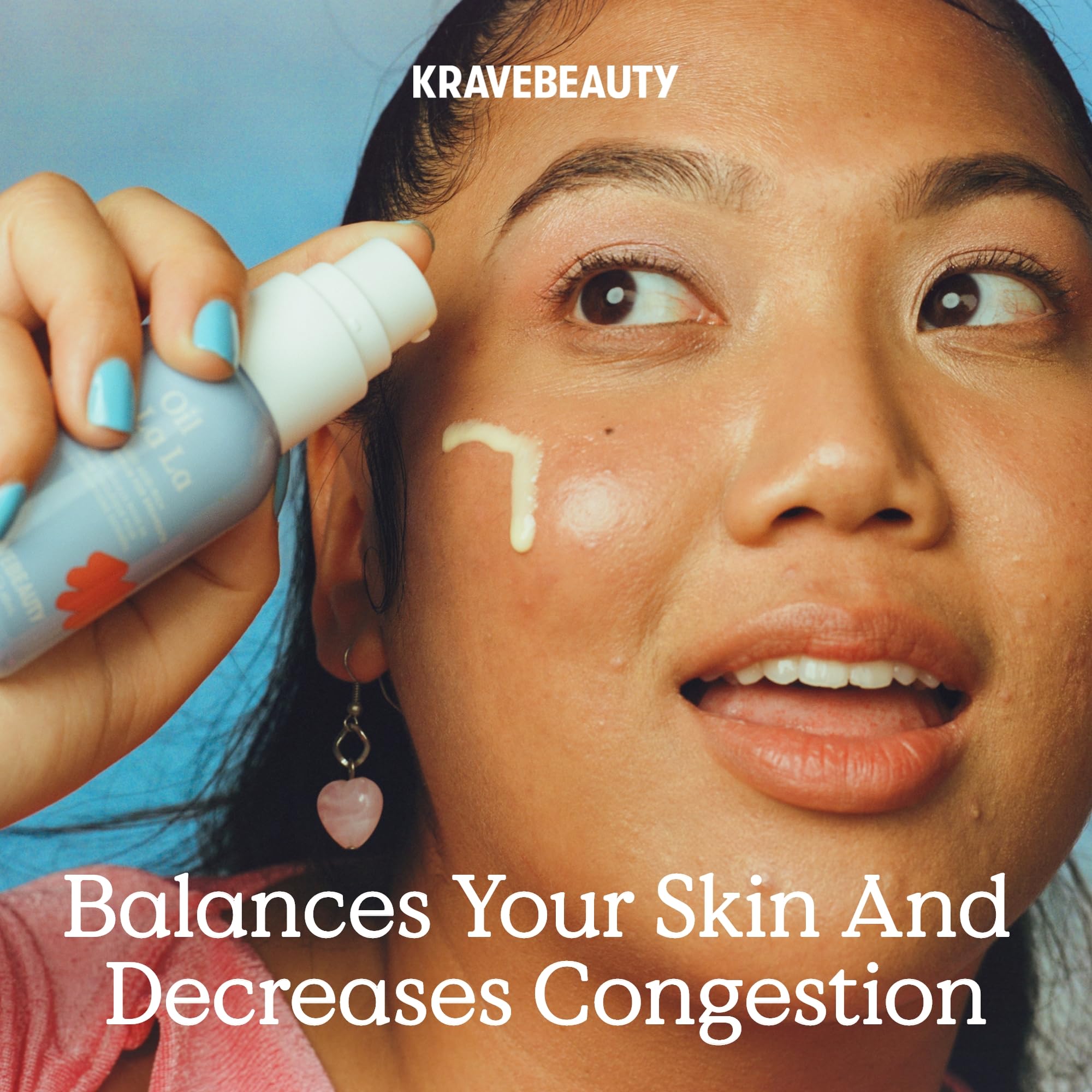 KraveBeauty Oil La La Serum being massaged into skin during routine