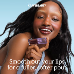 KraveBeauty Plumptuous applied on lips in lifestyle scene for dewy, fuller look
