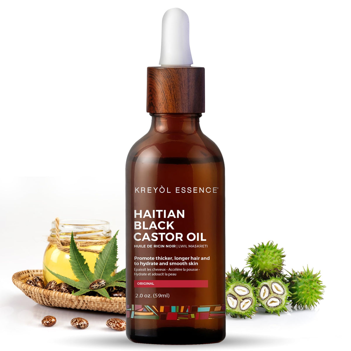 Kreyol Essence 2oz Haitian Black Castor Oil bottle—promotes thicker hair and natural shine.