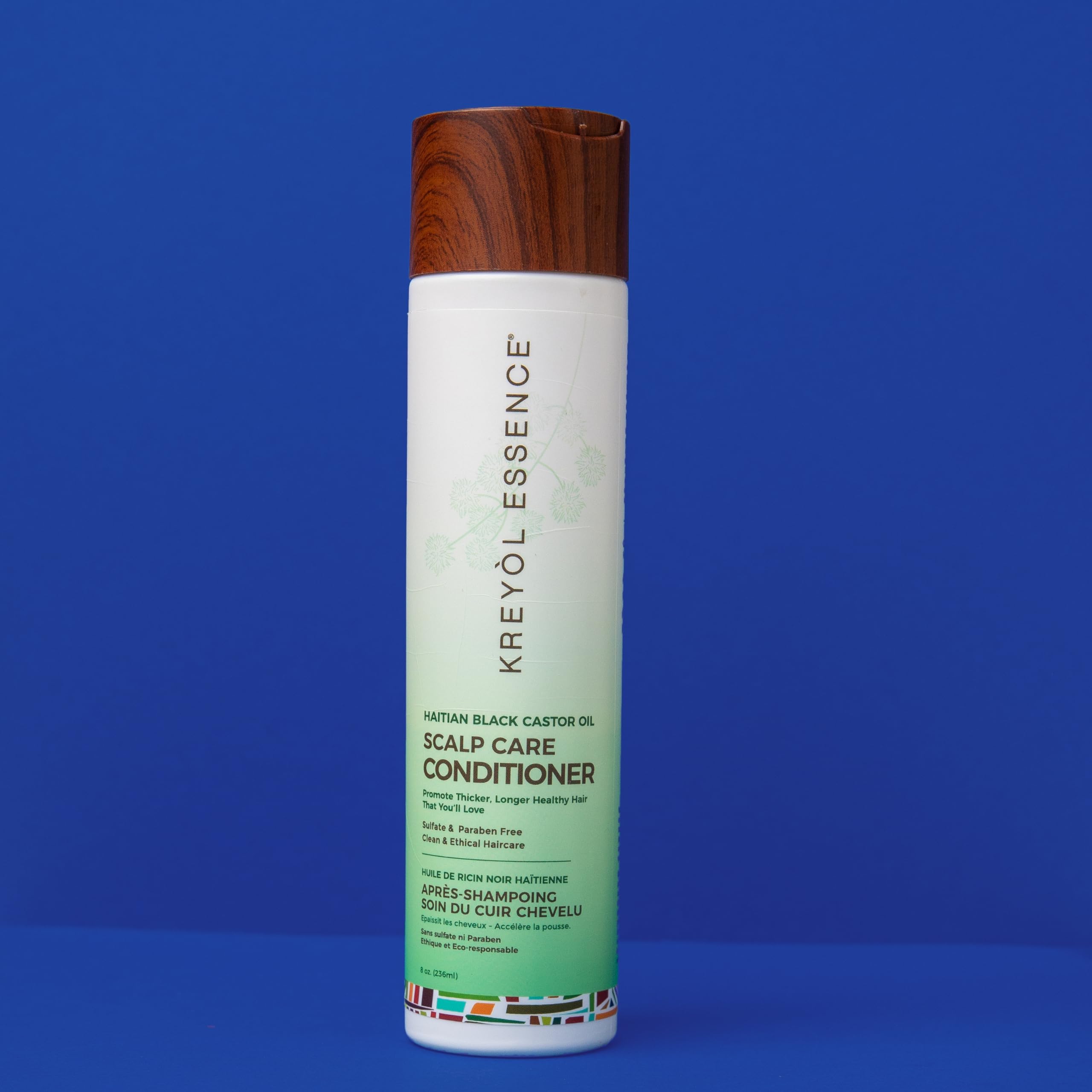 Kreyol Essence Green Tea Quinoa blend highlights nutrient-rich formula for healthier hair.