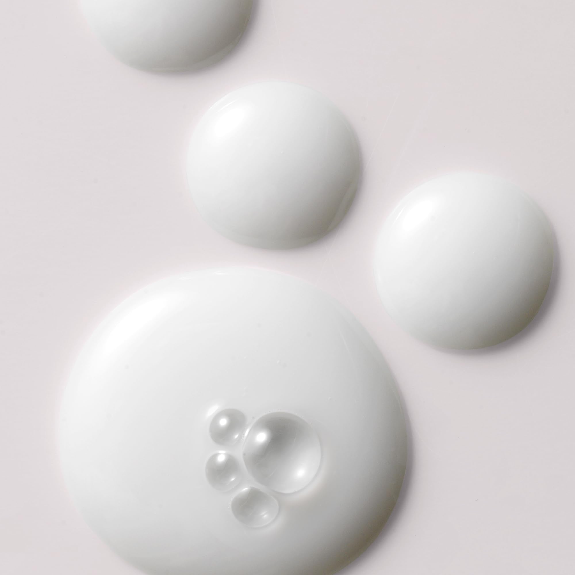 Kristin Ess Anytime Anywhere Milk Oil ingredients show avocado, castor, jojoba, coconut oils.
