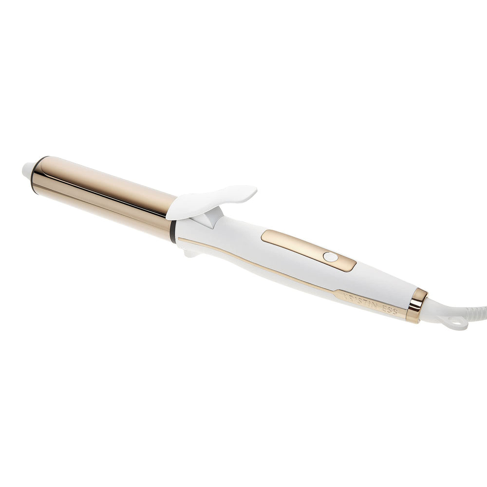 Kristin Ess Hair titanium curling iron barrel creates polished beach waves with added shine.