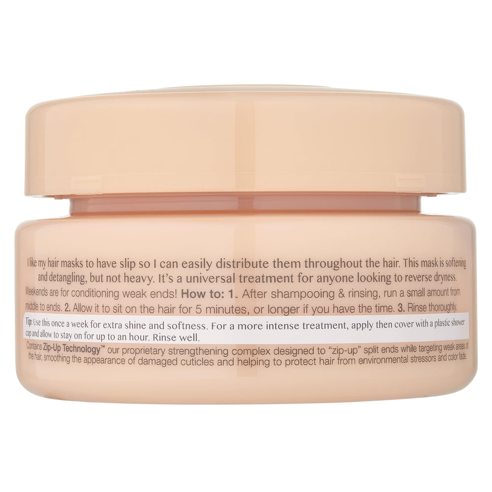 Kristin Ess hair mask application from middle to ends shows easy detangling and slip.