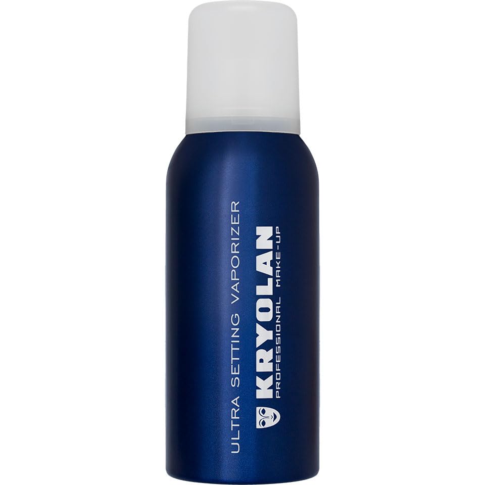 Kryolan Ultra Setting Vaporizer blue bottle releasing a fine mist for quick makeup setting