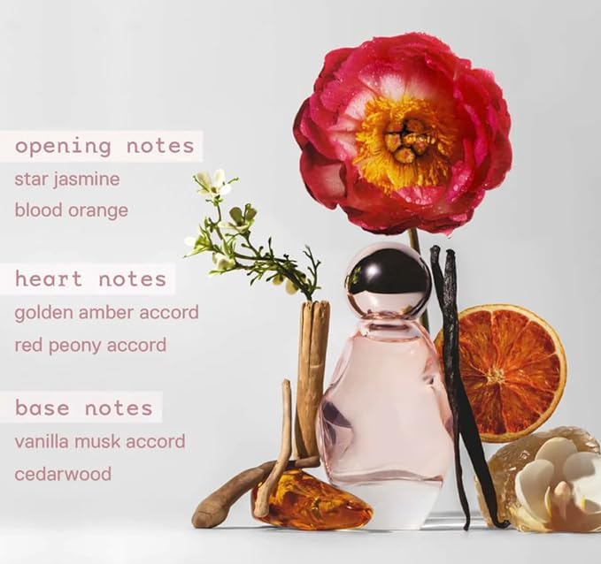 Kylie Cosmetics Cosmic bottle close-up highlights star jasmine and amber notes.
