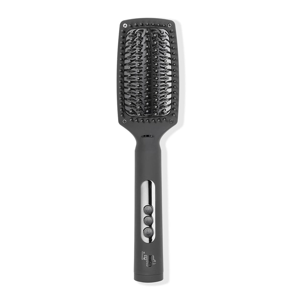 L'ANGE HAIR Le Vite Curve brush closeup showing curved bristles for faster straightening and frizz control.